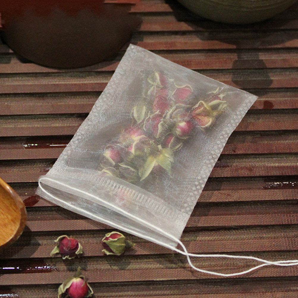 Herbal Tea - 使い捨てティーバッグ100個入り。ナイロン製のドローストリング付きフィルターバッグ。茶葉、ハーブ、コーヒー、スパイスなどを入れて、煮込み料理やスープに使用できる。